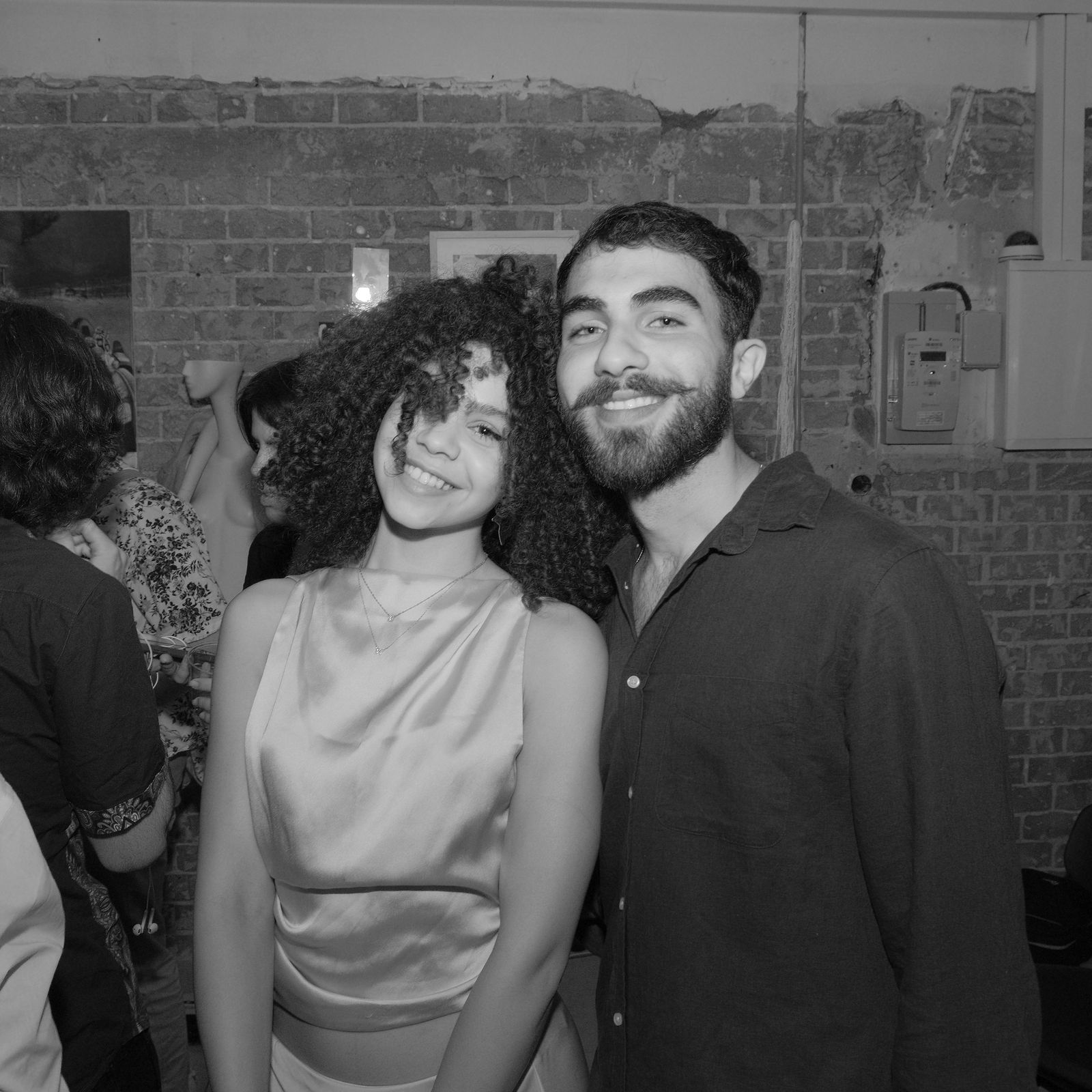 Couple smiling at a party